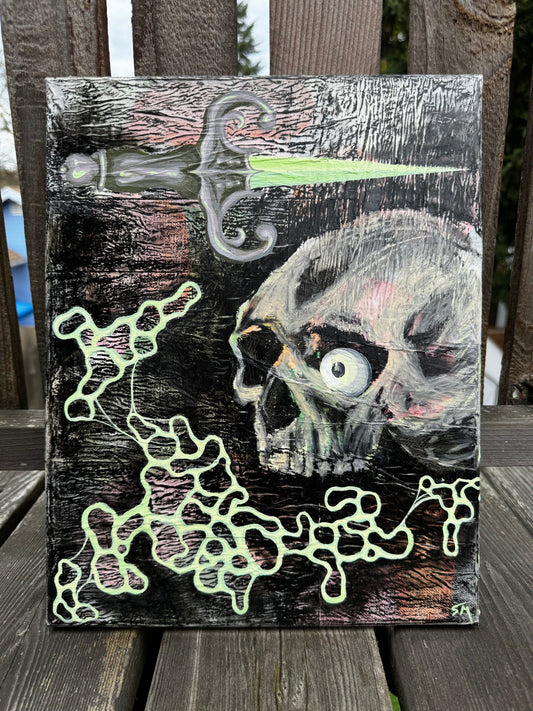 Straight on photo of a painting leaning against wooden deck. Painting is pastel pink, green, yellow, orange, and black. There is wrinkly texture, a skull with an eyeball, a dagger, and circular blobs